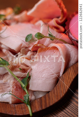 Beautiful slicing of fat and delicious fresh bacon Beautiful slicing of fat and delicious fresh bacon 122682641