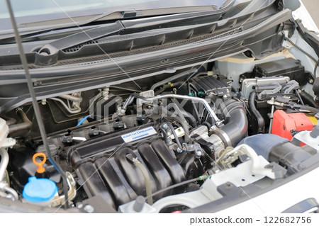 Passenger car with the hood open (hybrid engine vehicle) Passenger car with the hood open (hybrid engine vehicle) 122682756