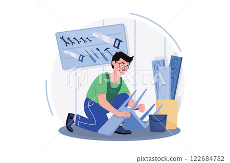 Carpenter Working In A Workshop 122684782