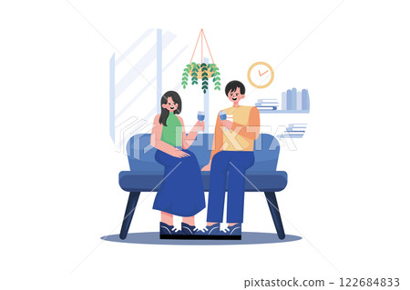 Young Couple Sitting At Armchairs In The Room Holding Wineglasses 122684833