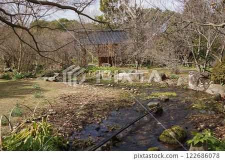 The babbling brook and gazebo 122686078
