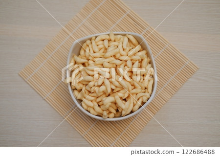 telur gabus sticks on white bowl 122686488