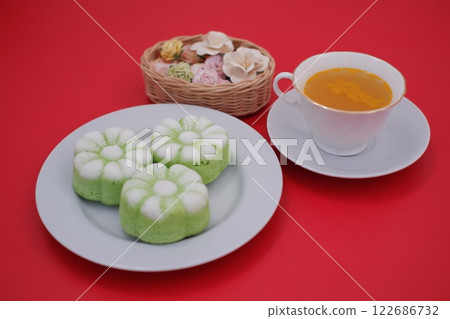 Kue Putu Ayu is one of the traditional wet cakes that have a soft texture. Kue Putu Ayu is one of the traditional wet cakes that have a soft texture. 122686732