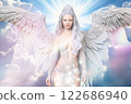 Smiling angel with big wings 122686940