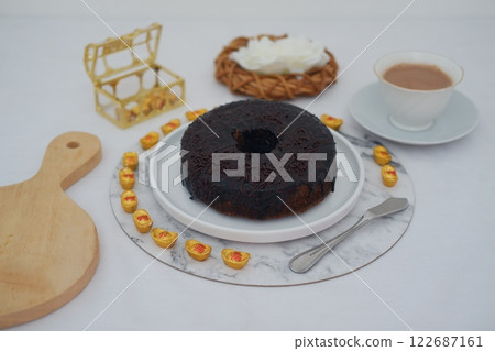 Chocolate cake on plate with white background 122687161