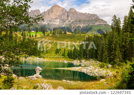 Karersee small alpine lake in Dolomites in South Tyrol, Italy 122687393