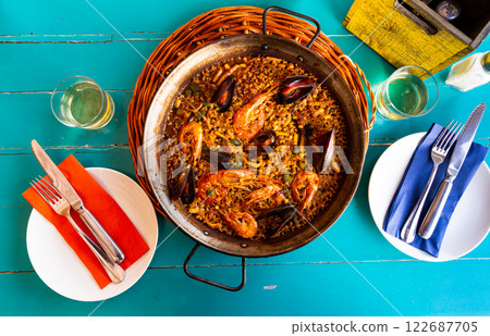 Paella with seafood - traditional Spanish dish Paella with seafood - traditional Spanish dish 122687705