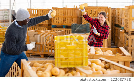 Two positive farmers are indulging during a break at work 122687758