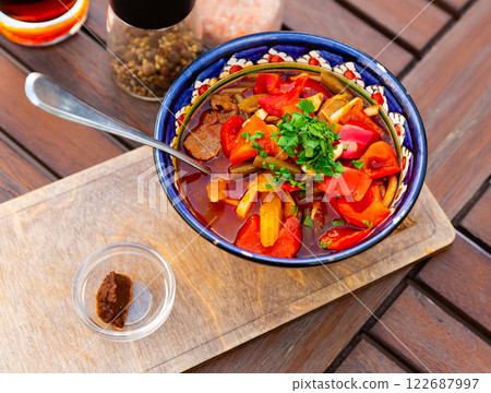 Portion of Uyghur laghman served in soup bowl Portion of Uyghur laghman served in soup bowl 122687997