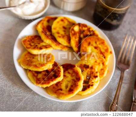 National dish syrniki with smetana National dish syrniki with smetana 122688047