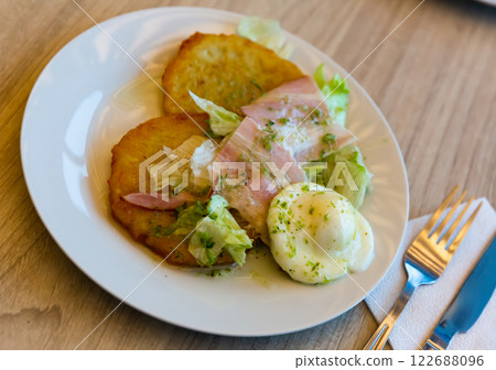 Potato pancakes with bacon and egg Potato pancakes with bacon and egg 122688096