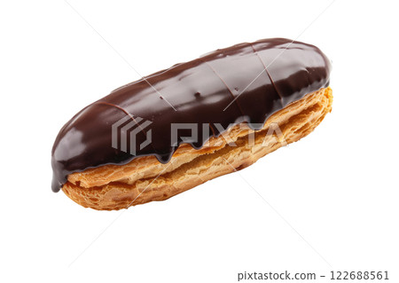 chocolate eclair with a glossy chocolate glaze, isolated background 122688561