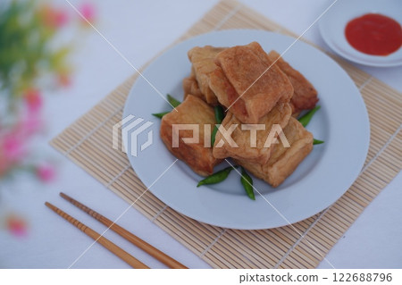 Tahu Bakso, Indonesian traditional snack made from tofu and beef. Served in white plate Tahu Bakso, Indonesian traditional snack made from tofu and beef. Served in white plate 122688796