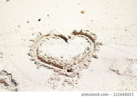 Heart drawn on the beach sand Heart drawn on the beach sand 122688825