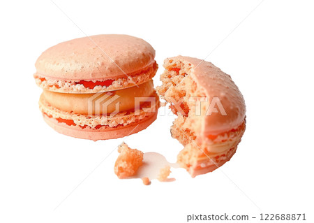 macaron with a bite taken out isolated background 122688871