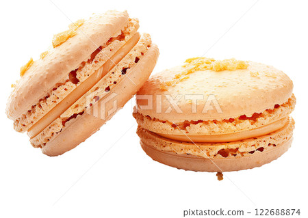 macaron with a bite taken out isolated background 122688874