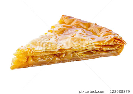 piece of baklava with honey drizzled on top isolated background 122688879