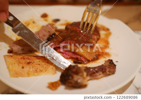 French toast with fried meat and potato chips on a white plate. French toast with fried meat and potato chips on a white plate. 122689086