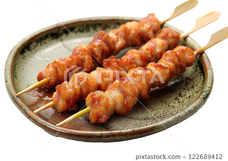 plate of yakitori skewers isolated on a white background plate of yakitori skewers isolated on a white background 122689412