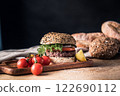 Hamburger homemade on wood table. 122690112