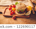 Hamburger homemade on wood table. 122690117