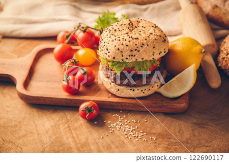 Hamburger homemade on wood table. Hamburger homemade on wood table. 122690117