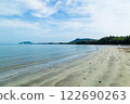The sand beach and the sea. 122690263