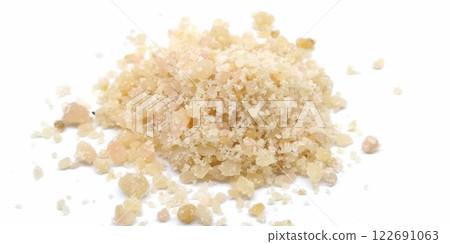 A picture of asafoetida powder isolated on a white background A picture of asafoetida powder isolated on a white background 122691063