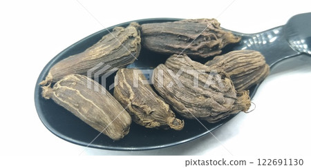 A picture of black Cardamom isolated on white background A picture of black Cardamom isolated on white background 122691130
