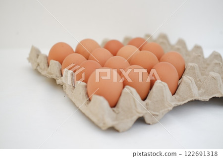 Eggs in a carton. Selective focus. 122691318