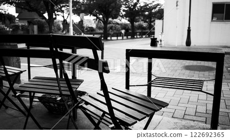 Monochrome photography, cinematic, cafe terrace, chairs 122692365