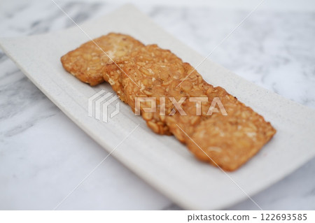 Fried tempeh is a popular Indonesian dish made from tempeh Fried tempeh is a popular Indonesian dish made from tempeh 122693585