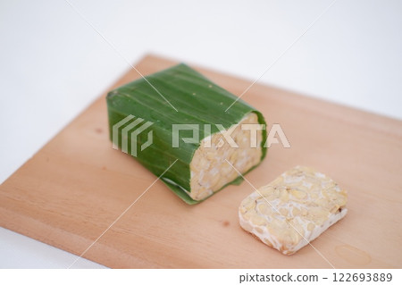 Tempeh is a traditional Indonesian food made from soybeans fermented with the Rhizopus oligosporus fungus Tempeh is a traditional Indonesian food made from soybeans fermented with the Rhizopus oligosporus fungus 122693889