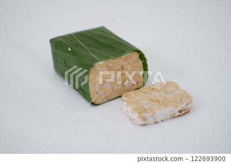 Tempeh is a traditional Indonesian food made from soybeans fermented with the Rhizopus oligosporus fungus Tempeh is a traditional Indonesian food made from soybeans fermented with the Rhizopus oligosporus fungus 122693900