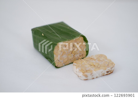 Tempeh is a traditional Indonesian food made from soybeans fermented with the Rhizopus oligosporus fungus Tempeh is a traditional Indonesian food made from soybeans fermented with the Rhizopus oligosporus fungus 122693901
