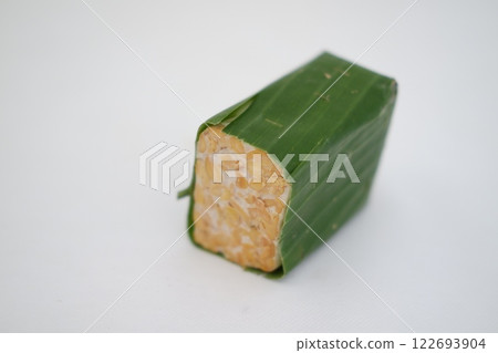 Tempeh is a traditional Indonesian food made from soybeans fermented with the Rhizopus oligosporus fungus Tempeh is a traditional Indonesian food made from soybeans fermented with the Rhizopus oligosporus fungus 122693904