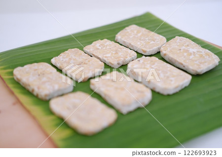 Tempeh is a traditional Indonesian food made from soybeans fermented with the Rhizopus oligosporus fungus Tempeh is a traditional Indonesian food made from soybeans fermented with the Rhizopus oligosporus fungus 122693923