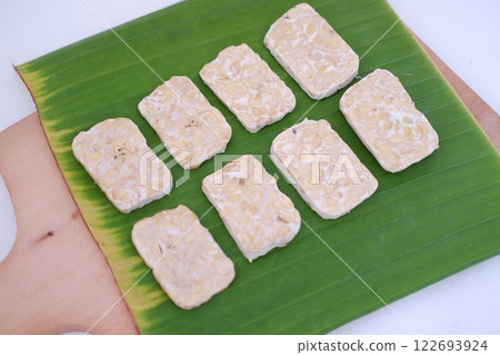 Tempeh is a traditional Indonesian food made from soybeans fermented with the Rhizopus oligosporus fungus Tempeh is a traditional Indonesian food made from soybeans fermented with the Rhizopus oligosporus fungus 122693924