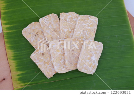 Tempeh is a traditional Indonesian food made from soybeans fermented with the Rhizopus oligosporus fungus Tempeh is a traditional Indonesian food made from soybeans fermented with the Rhizopus oligosporus fungus 122693931