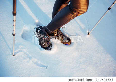 Woman Traveler with backpack hiking Travel Lifestyle adventure concept active vacations outdoor. Beautiful landscape forest 122695551