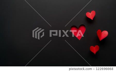 abstract dark background for Valentine day holiday, red hearts shape on a black backdrop with copy space abstract dark background for Valentine day holiday, red hearts shape on a black backdrop with copy space 122696668