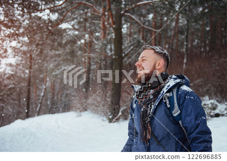 Man Traveler with backpack hiking Travel Lifestyle adventure concept active vacations outdoor. Beautiful landscape forest Man Traveler with backpack hiking Travel Lifestyle adventure concept active vacations outdoor. Beautiful landscape forest 122696885