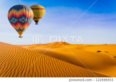 Desert and hot air balloon Landscape at Sunrise. Travel, inspiration, success, dream, flight concept 122696933