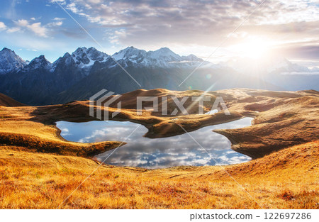 Sunset on mountain lake Koruldi. Upper Svaneti, Georgia, Europe. Caucasus mountains 122697286