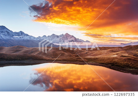 Mountain Lake. Beautiful sunrise. Morning landscape. Koruldi Lake. Main Caucasian ridge Mountain Lake. Beautiful sunrise. Morning landscape. Koruldi Lake. Main Caucasian ridge 122697335
