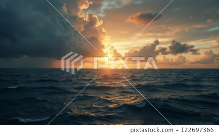an impressive seascape, beautiful waves in the ocean at sunset, the sunlight of the setting sun on the horizon breaking through the clouds of the dramatic sky 122697366