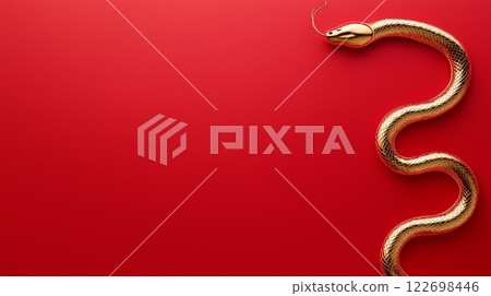 Golden snake on vibrant red background with glossy texture and curved design 122698446