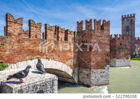 Ponte di Castelvecchio bridge also know as Scaliger Bridge over Adige River in Verona town, Italy, Europe. Ponte di Castelvecchio bridge also know as Scaliger Bridge over Adige River in Verona town, Italy, Europe. 122700208