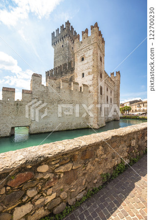 Scaligero Castle in historical centre of Sirmione, on Lake Garda, Italy, Europe. 122700230