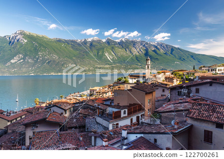 Limone Sul Garda town on shore of Lake Garda with mountains in background, Italy, Europe. 122700261